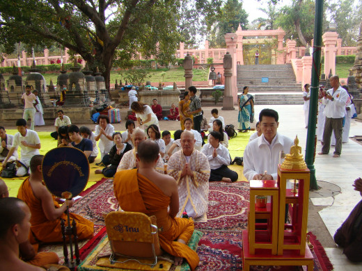 Monks Being Ordained Beneath The Bodhi Tree, Bodh Gaya. The Jewelled Walk In The Background