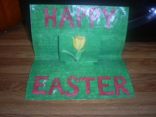 This tutorial will demonstrate how to make a cute Happy Easter pop-up card.