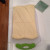 Put the flat dough on the cutting board. Put the flat dough on the cutting board.