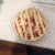 Put the dough strips on top of the pie crust mixture. Put the dough strips on top of the pie crust mixture.