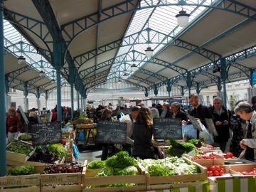 The Saturday market in Chartres, France has a wonder shade structure that is permanent.