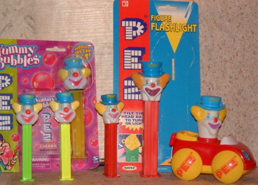 Here are some of my variations on Peter PEZ.  Regular dispensers with differently-colored stems are fairly common.  The flashlight is very rare.