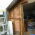 This shows the exposed insulation inside the wall. It will need to be covered with tar paper and then with the siding. This shows the exposed insulation inside the wall. It will need to be covered with tar paper and then with the siding.