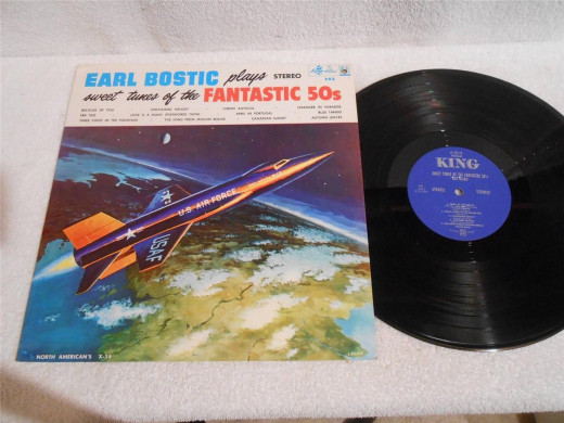 The art work on the album cover is of a X-15 the first manned craft to probe outer space. The X-15, which will fly man higher and faster than h has ever been. 