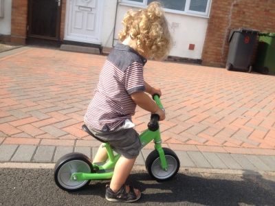 Here is my son on his balance bike. He received it for his 2nd birthday and it's one of the best toys he has. He rides it almost every day.