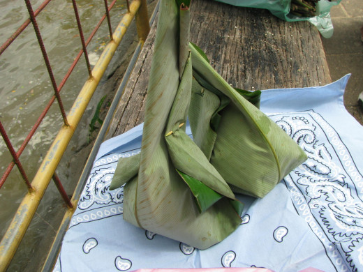 Pitjil from food stand along the road, wrapped in banana or other leaves