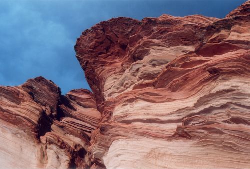 If you are familiar with The Wave and the Coyote Buttes, you can probably see a resemblance to these cliffs.