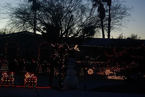 Another year, a display in front of a house, not quite dark.