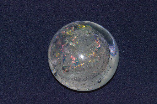 Glass ball with bubbles and iridescent flakes, probably from Italy
