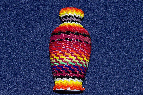 Vase covered in Indian beads