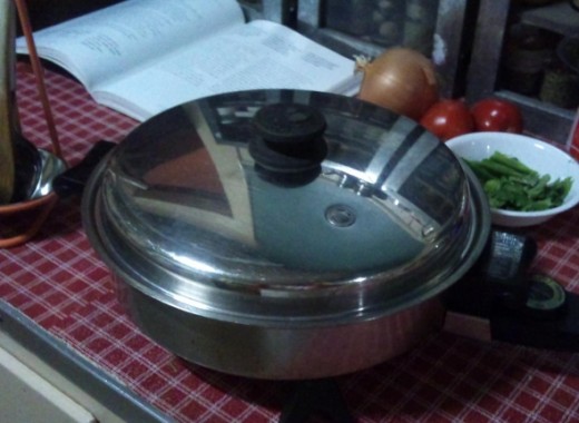 Final cooking with lid on the electric skillet.  40-45 minutes.
