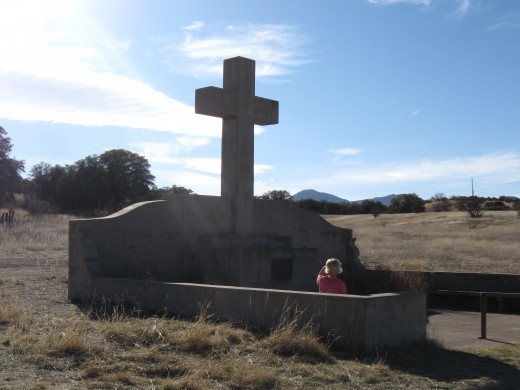 Monument to Spanish explorer Fray Marcos de Niza dominating the landscape of San Raphael Valley area of Coronado National Forest in Arizona.