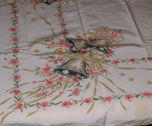 Wedding bells printed on this vintage tablecloth.