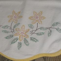 Dresser scarf with paint embroidery.