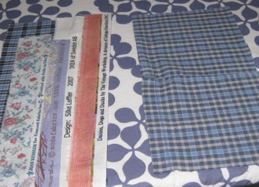 Strips of selvage ready to be sewn together.