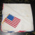 Flag hankie. Flag stitched on white cotton handkerchief with red, white, and blue tatted border. Flag hankie. Flag stitched on white cotton handkerchief with red, white, and blue tatted border.