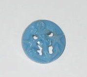 Decorative blue open design or filigree button. Two stars on either side of a torch in the middle.