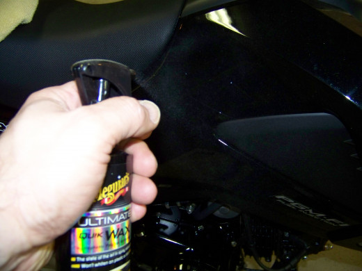 I uses Meguiar's Ultimate Quik Wax with a clean chamois on the painted and plastic surfaces.