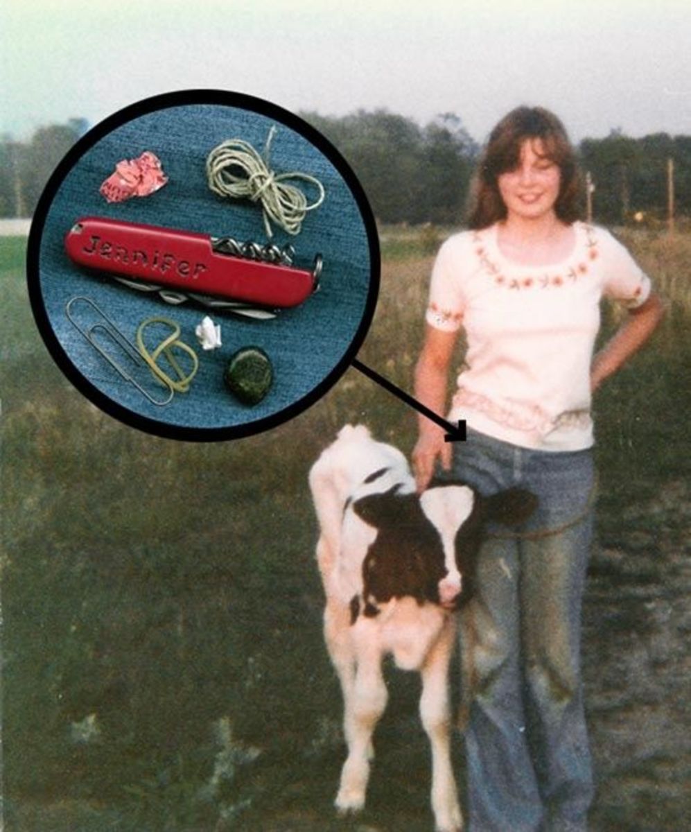 Young teen with a calf and a Swiss Army knife