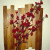Wood shims + glue gun + silk flowers = Cheap Shim Chic. How to link below.