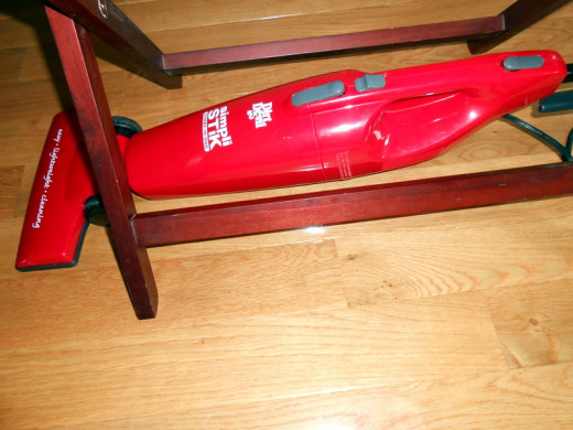 This flexible vacuum works horizontally as well as in a vertical position. Look how low it goes!