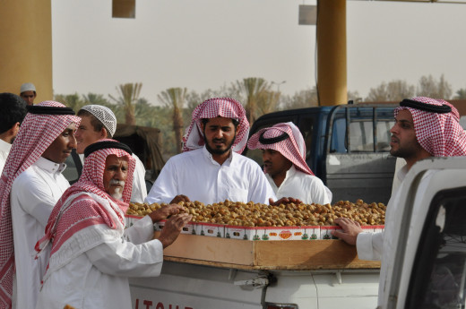 Middle class Saudi traders carry wide range of things on a pickup and sell on streets.