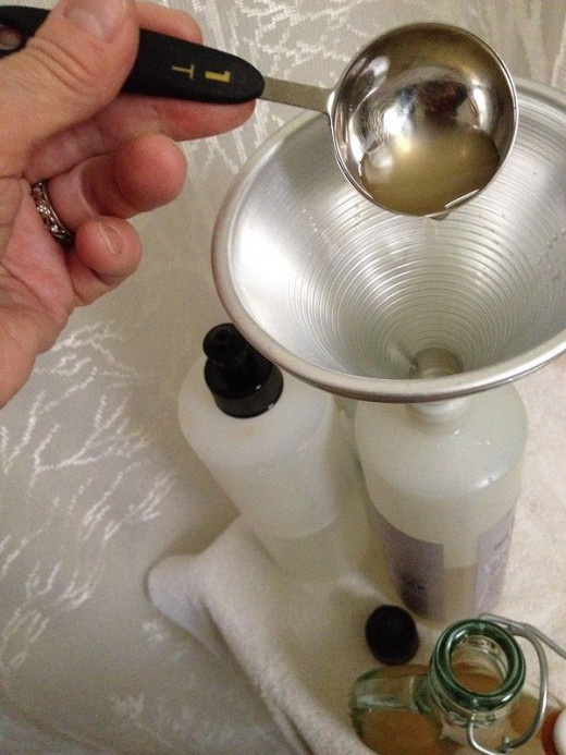 A funnel makes measuring and pouring the vinegar quick and totally mess free