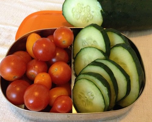 Simple fair that is tasty and colorful, like these assorted tiny tomatoes and cucumber wheels makes for a quick, easy start to a delectable picnic