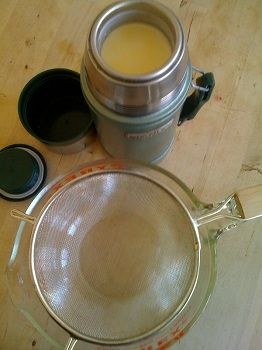 Chilled homemade yogurt in thermos, ready to strain