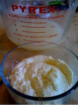 Cheesecloth-dimpled Greek-style yogurt turned into storage container