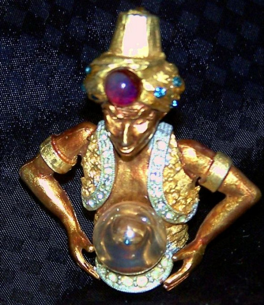 This fortune teller is an excellent example of costume jewelry designed to have a more luxe look. 