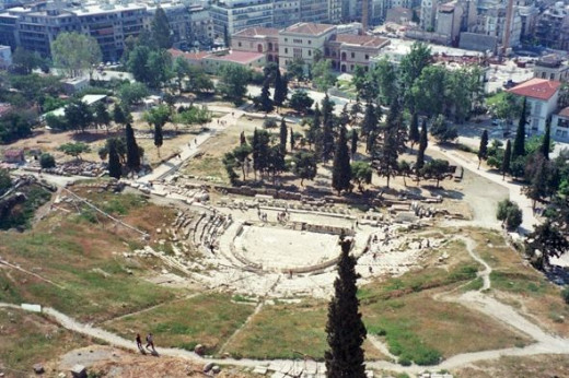 And on the opposite side of the Acropolis, if you look waaaaay down over the wall... it's the Theater of Dionysos, where all the famous plays of ancient Greece were staged!