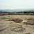 The Megaron of the Palace of Tiryns. It's hard to visualize, but this would've been a great hall with a hearth in the middle (the stone ring) supported by four large wooden columns on stone bases (one visible in foreground).