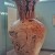 The side view of the Eleusis Amphora shows the decapitated body of Medusa -- which explains why her sisters are chasing Perseus as he runs away with the Gorgon's head. Notice the door in the background: this vase is huge. (I don't have