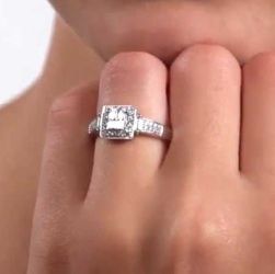 Quad Engagement Ring on Finger