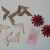 Embellishments - photo corners, Gerbera daisy fabric flowers and a card or chipboard quote tag Embellishments - photo corners, Gerbera daisy fabric flowers and a card or chipboard quote tag