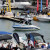 Another one from the In Water Boat Show. Someone's taking a test drive. Another one from the In Water Boat Show. Someone's taking a test drive.