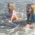 This was my smallest girls' first time in the ocean! They were so excited! Here they are bracing for a wave to hit them. This was my smallest girls' first time in the ocean! They were so excited! Here they are bracing for a wave to hit them.