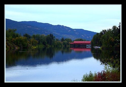 Beautiful reflections of this bridge in Sandpoint, Idaho on the water.  The Railroad bridge near Sandpoint