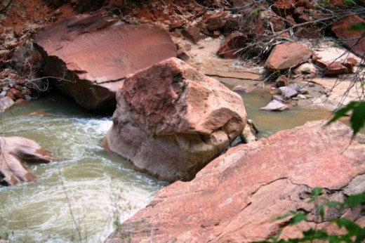 Rock in the river shaped like a fist