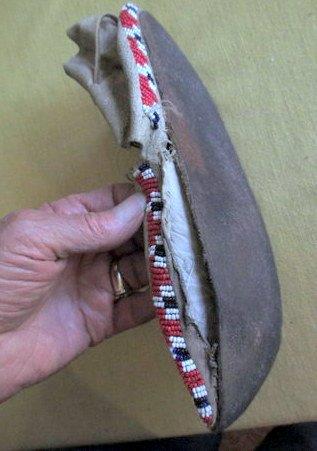 Shows some of the ripped leathers from top to sole.