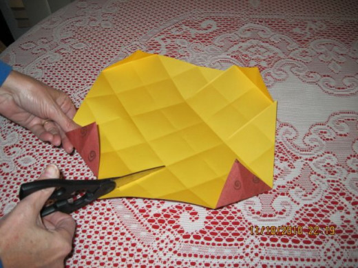 Turn and cut along the opposite corners