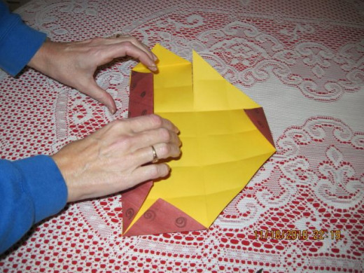 Fold again to the middle