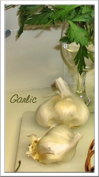 Wash and slice a few cloves (2-3 depending on size)  to be added to the rappini.