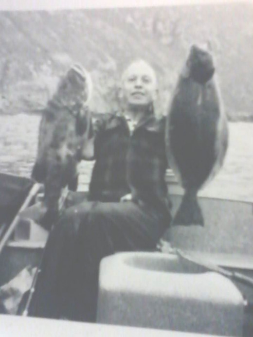 Grandpa Powell with a baby black seabass and a nice haibut.