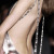The back is waaaay too low but I do love the long necklace like jewelry hanging down the back. The back is waaaay too low but I do love the long necklace like jewelry hanging down the back.