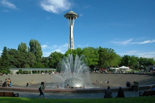 Seattle Center is the home to the Space Needle and the International Fountain (foreground). The center and the attractions were built as part of the 1962 World's Fair hosted in Seattle.