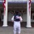 Ricky Toting His Newly Purchased Patriotic Backpack in Front of the American Adventure