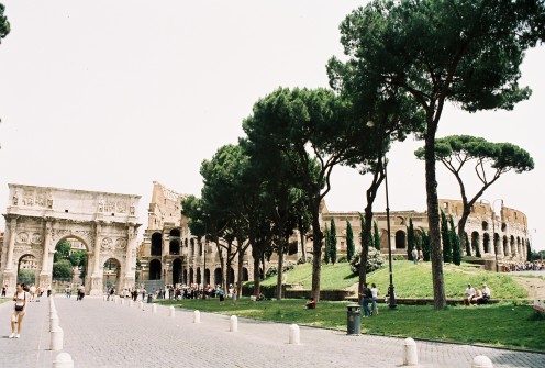 The Arch of Constantine on the left and the Colosseum on the right. The arch was erected in 315 A.D. to commemorate the triumph of Constantine I after his victory over Maxentius in the battle at the Milvian Bridge in 312 A.D.