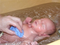 Baby boy bath time. Photo credit belongs to Elsie Hagley